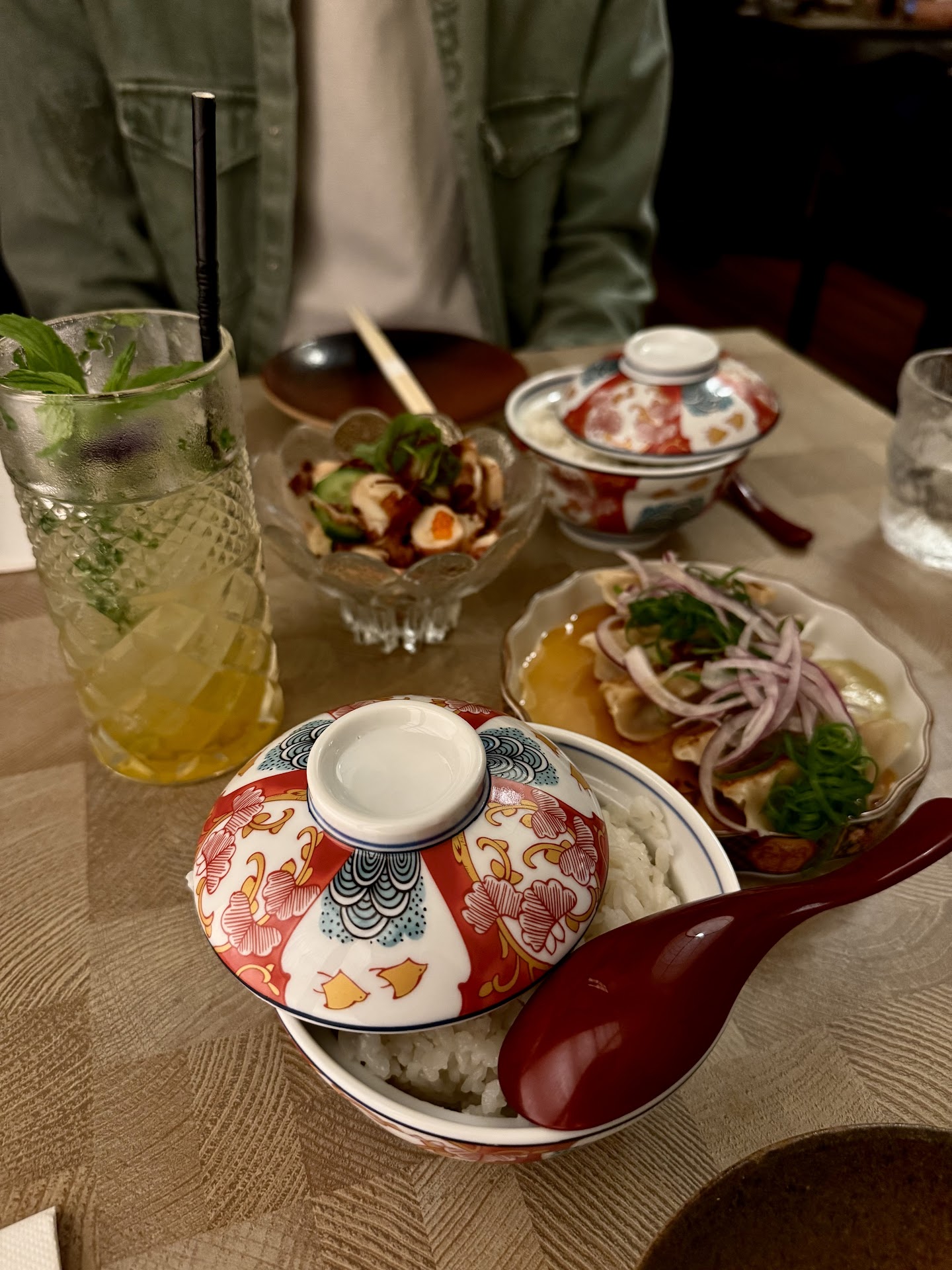 Japanese small plates and drinks on a Mitto table